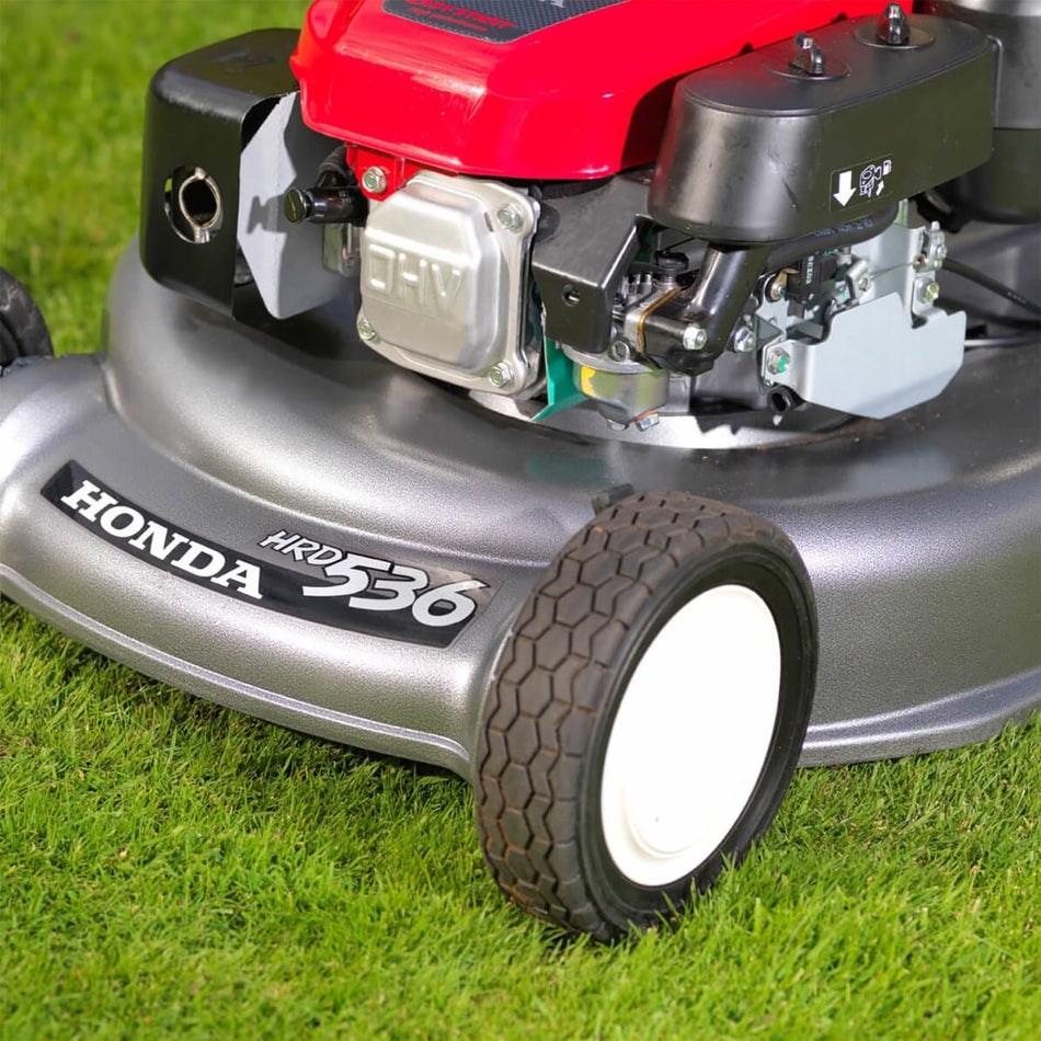 Masina de tuns iarba cu rulou posterior Honda HRD 536 QX, 4.3 CP, benzina, 53 cm, 80 L, autopropulsata 1 viteza, Rotostop - blocarea lamei + Golire cos fara a opri motorul